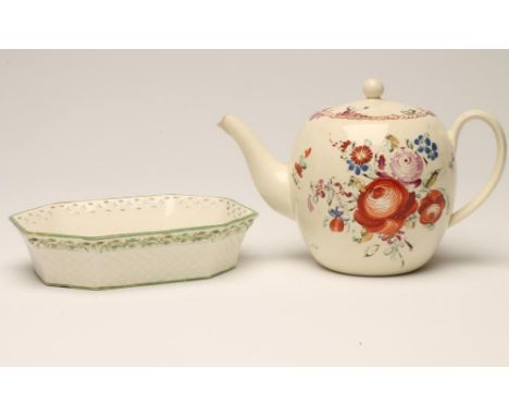 A LEEDS CREAMWARE TEAPOT AND COVER, c..1810, of rounded form with plain pulled handle, painted in polychrome on-glaze enamels