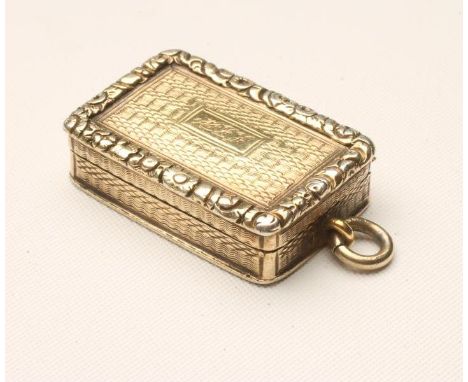 A GEORGE III SILVER GILT PENDANT VINAIGRETTE, maker Joseph Willmore, Birmingham possibly 1819, of plain oblong form with foli