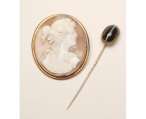 A VICTORIAN SHELL CAMEO, the oval panel carved with the head and shoulders portrait of a young classical lady wearing flowers