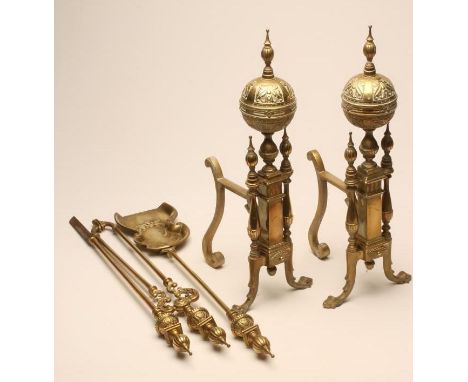 A PAIR OF VICTORIAN BRASS ANDIRONS in Renaissance revival style, the square central stem surmounted by a foliate embossed orb