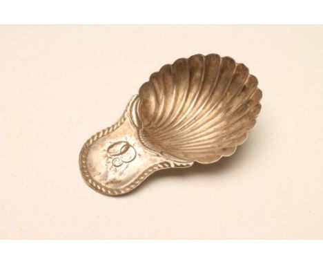 A GEORGE III SILVER CADDY SPOON, maker Henry Tudor and Thomas Leader, Sheffield 1783, with shell bowl and lug handle engraved