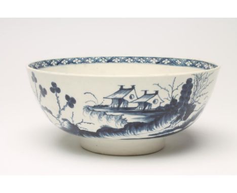 A FIRST PERIOD WORCESTER "PRECIPICE" PATTERN PORCELAIN BOWL, c.1770, painted in underglaze blue, open crescent, 9" diameter (