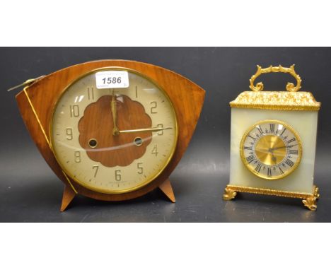 A Smiths chiming mantel clock, presented to J. Goulder by the staff of L.E.F. ltd 1961, with key; an Elsinor onyx and gilt cl