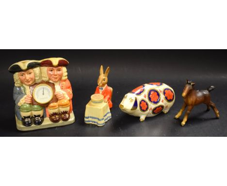 A Royal Crown Derby paperweight pig, silver stopper; a Royal Doulton Happy birthday Bunnykins; a Beswick brown gloss foal; a 