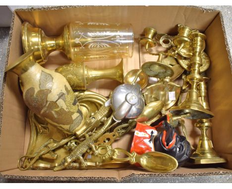 A novelty Jolly N****r money bank, late 20th century; 19th century and later brass Welsh spoons; George II design candlestick