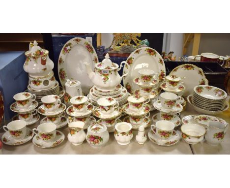 A Royal Albert Old Country Roses six setting tea service, burnished gilt rims; dinner plates; quantity; others similar