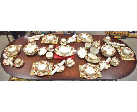 A Royal Albert Old Country Roses dinner service for six comprising dinner plates, salad plates, side plates, dessert dishes, 