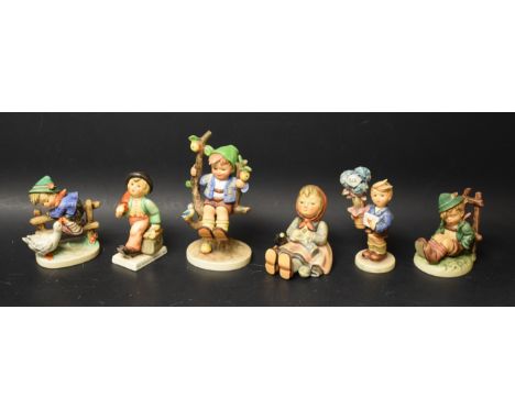 A Goebel Hummel figure Afternoon nap, Merry Wanderer, Good News, Happy pastime, Barnyard Hero, Apple Tree Boy, all boxed (6)