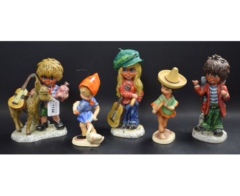 A Goebel figure, boy with donkey, impressed mark, MIC 15 1971; others similar (5)