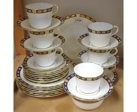 A Royal Crown Derby Kedleston pattern tea service comprising 21cm plates, 16cm plates, sugar bowl, cups and saucers