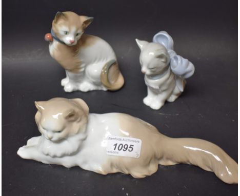 A Nao pottery model - Seated Cat;  others, Persian Cat lying;  Ribbon Bow, printed and impressed marks, (3)