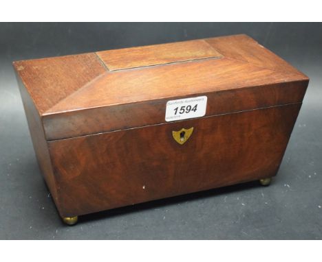 A mahogany sarcophagus tea caddy
