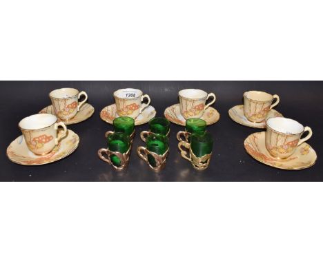 A set of six Gladstone Springtime demitasse cups and saucers; a set of six white metal cups with green glass liners (12) 