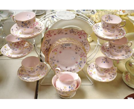 A Staffordshire Tuscan tea set, comprising six teacups, six saucers, six tea plates, sandwich plate, milk and sugar, printed 