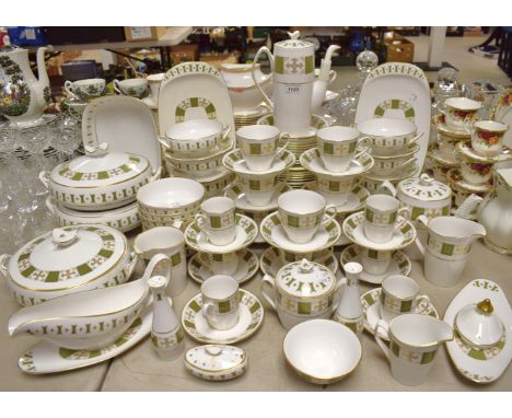 A Spode Persia pattern Y8018 dinner, tea and coffee service for eight comprising dinner plates, salad plates, tea plates,tea 