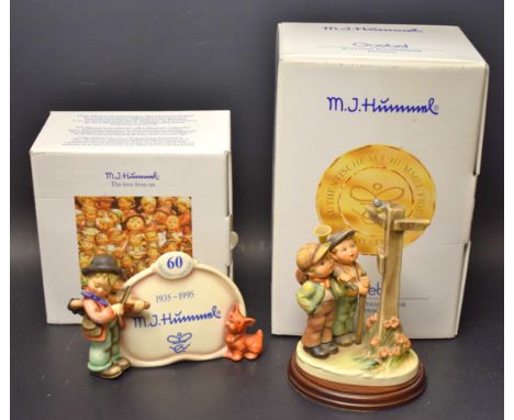 A Goebel Hummel figure Crossroads, boxed; a similar commemorative display plaque, boxed (2)  