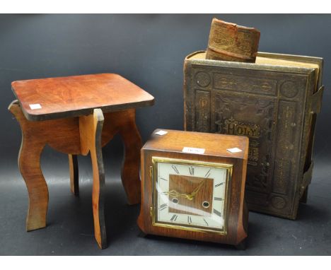 An oak Art Deco Smiths mantel clock; a large family bible with colour illustrations and brass fittings c.1878; a small oak oc