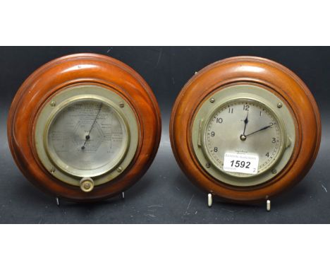 A Short & Mason bulkhead clock, silvered dial, Arabic numerals, mahogany frame;  a Conforming Barometer (2)