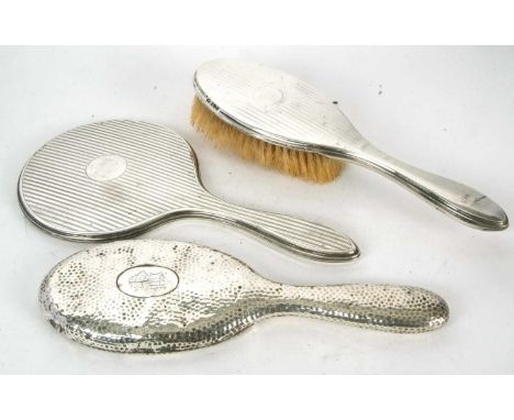 Mixed Lot:  A Victorian silver backed dressing table mirror having a spot hammered design, initialled, hallmarked Birmingham 