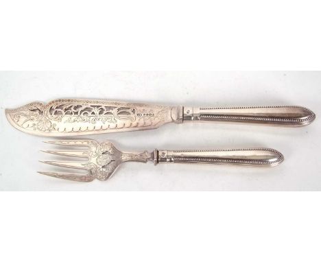 Pair of Victorian silver fish servers, the blades chased engraved with foliate, scrolls etc, the plain handles with beaded de