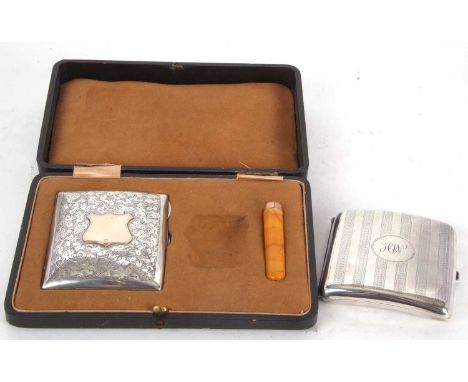 Mixed Lot: A cased Edwardian part set comprising cigarette case, chased and engraved all over with leaves, scrolls etc, the c