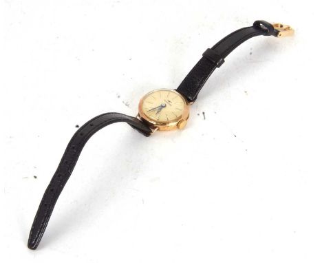 A yellow metal lady's Technos wristwatch, stamped inside the case back .75 and 18, it has a manually crown wound movement, a 