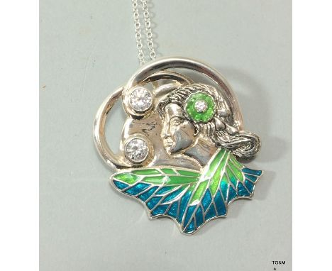 A silver enamel Art Nouveau style pendant necklace on silver chain