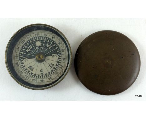A brass compass, possibly Edwardian