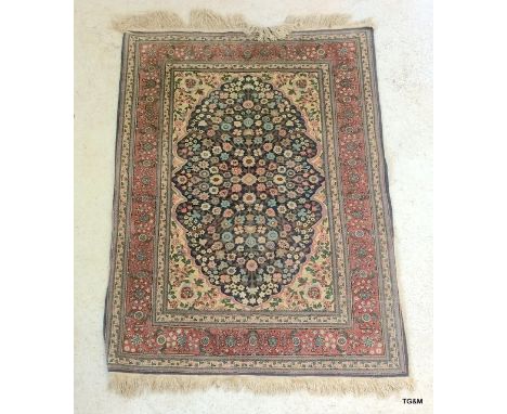 A red border blue internal Persian carpet 160 x 110cm