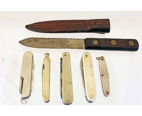 An early 20th century sheath knife by Gregory Brothers of Sheffield in its leather scabbard with five of pen knives