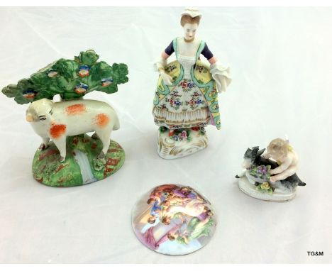 An old Staffordshire model of a sheep, a cherub, porcelain plaque and a model of a lady (possibly Sitzendorf)