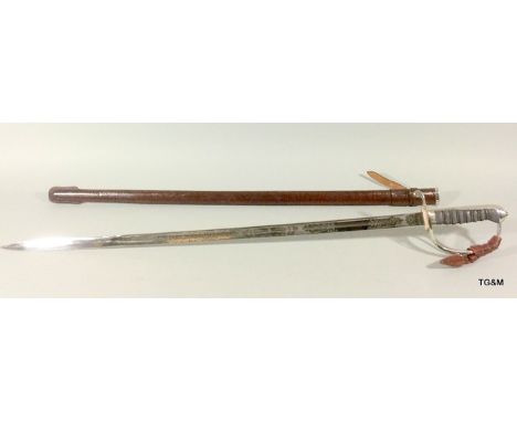 A Royal Artillery Officer's fine quality and excellent condition Wilkinson Sword with finely etched EIIR blade