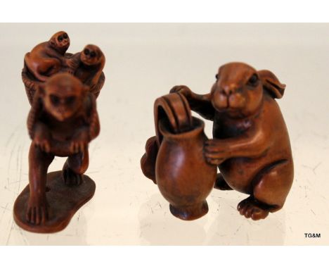 Two Japanese carved wood netsuke