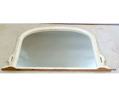An arch topped overmantle mirror
