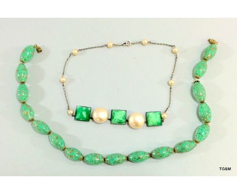 A ladies silver fitted pearl and jade necklace together with a green and gilt necklace