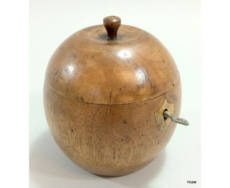 A fruitwood orange shaped tea caddy