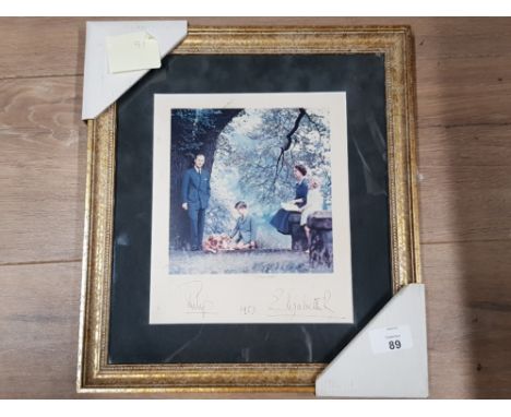 ATTRACTIVE FAMILY PHOTOGRAPH DEPICTING THE QUEEN AND PRINCE PHILIP WITH PRINCE CHARLES AND PRINCESS ANNE ALONG WITH TWO CORGI