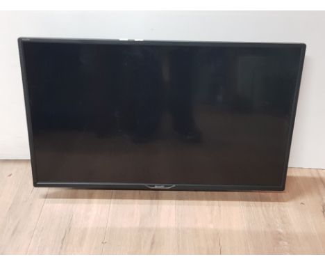 32 INCH SHARP TV WITH REMOTE AND FITTED WALL BRACKET
