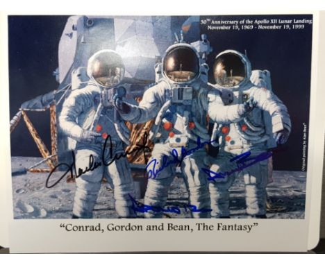 APOLLO 12-30TH ANNIVERSARY OF THE LUNAR LANDING NOV 19, 1999 COLOUR PHOTOGRAPH OF A PAINTING BY ALAN BEAN SHOWING 3 ASTRONAUT