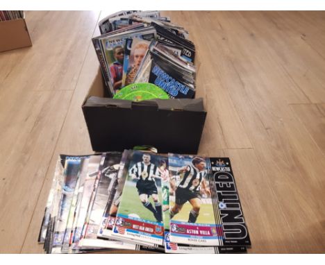A BOX CONTAINING A LARGE QUANTITY OF NEWCASTLE UNITED MATCH PROGRAMMES INCLUDES 1980S TO 1996 ETC PLUS A NEWCASTLE UNITED WAL