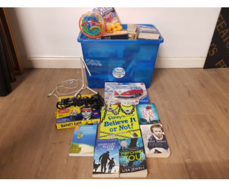 A BOX OF MISCELLANEOUS INCLUDES PUZZLES BOOKS READING LIGHT ETC