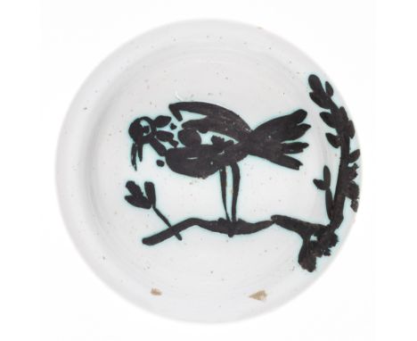 Pablo Picasso (1881-1973)Oiseau sur la Branche Terre de faience ashtray painted and glazed with oxide, 1952, from the edition