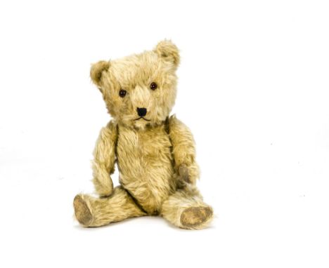 ANNOUNCE NEW DESCRIPTION,A post-war Chitern Hugmee Teddy Bear, with light golden mohair, orange and black glass eyes, black s