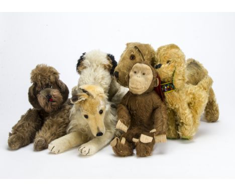 Various soft toys, Pedigree - dog with red felt slipper in mouth —11in. (28cm.) high and a monkey; a Steiff post-war lying Ge