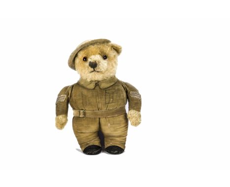 A very rare Chiltern Home Guard teddy bear 1940s, With golden mohair head and hands, orange and black glass eyes, black stitc