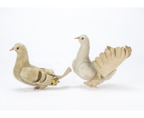 Two post-war Steiff pigeons, A grey mohair pigeon with velvet tail and wings, plastic feet with button and yellow cloth tag (