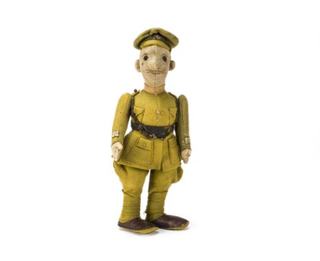 A rare Harwin 1st World War Tommy felt doll,  The face with central seam, black boot button eyes, painted moustache, eyebrows