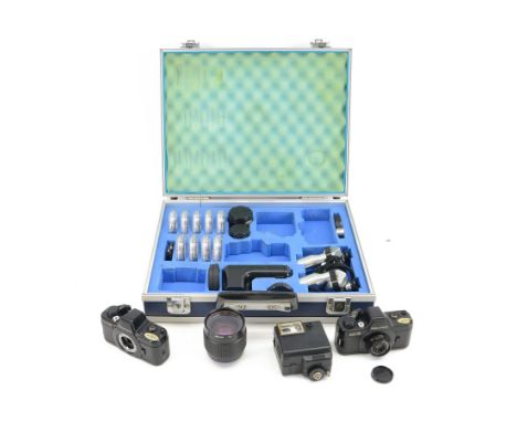 Pentax Auto 110 camera outfit, comprising two camera bodies, serial nos. 2055664 & 1062072, Pentax-110 1:2.8 18mm lens serial