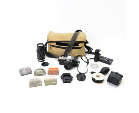 Olympus OM10 SLR camera body serial no. 2255944, with three Olympus OM-System Zuiko lenses including Auto-S 50mm 1:1.8, Auto-