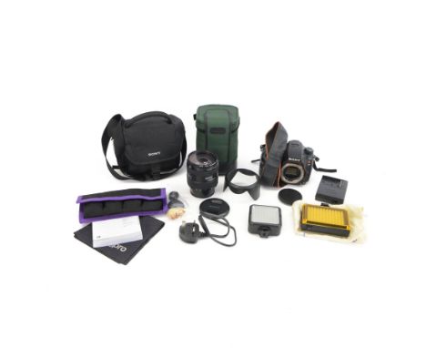 Sony Alpha A77 digital SLT camera body serial no. 0715628, with a Sony DT 2.8/16-50 SSM lens, serial no. 1810590, boxed with 